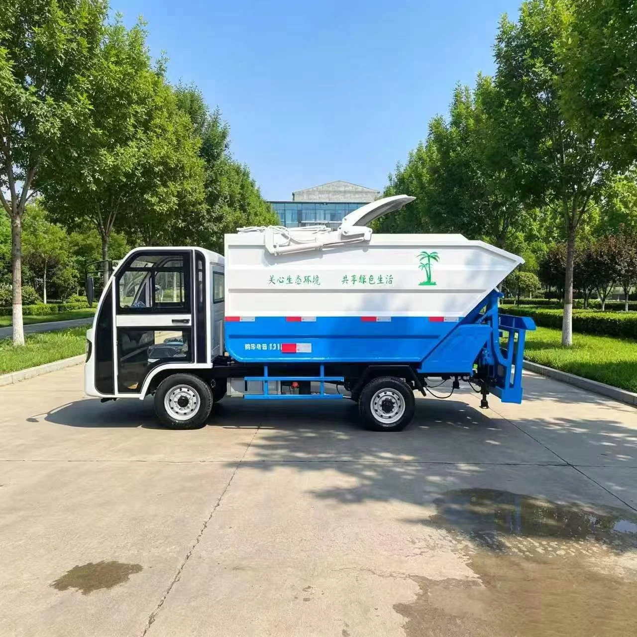 Mẫu xe ép rác mini bốn bánh, góc nhìn bên hông. Ảnh mẫu phương tiện do MINGMA cung cấp.